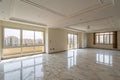 Interior of empty apartment with wide marble floor Royalty Free Stock Photo