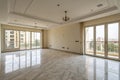 Interior of empty apartment with wide marble floor Royalty Free Stock Photo