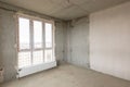 Interior of an empty building with large stained-glass window in a new building