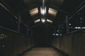 Interior of an empty horse barn with cages shot in low exposure Royalty Free Stock Photo