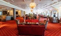 Empty hotel lobby with vintage furniture.