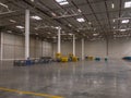 Interior of empty large modern warehouse garage. Royalty Free Stock Photo