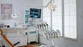 Interior of empty modern stomatology orthodontic hospital bright office