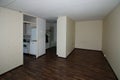 Interior of empty old apartment studio with living room and kitchen Royalty Free Stock Photo