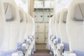 Interior of empty ready to fly airliner cabin with rows of seats