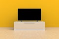 Interior of empty room with TV, Living room led tv on yellow wall with wooden table modern loft style Royalty Free Stock Photo