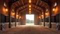 Interior of empty rustic barn with wooden walls. Natural light streams inside. Stable features traditional architecture. Perfect Royalty Free Stock Photo