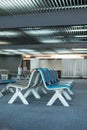 Interior empty seats of departure lounge at the airport,Waiting area with chairs Royalty Free Stock Photo