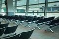 Interior empty seats of departure lounge at the airport,Waiting area with chairs Royalty Free Stock Photo