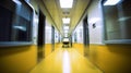 Interior of an empty yellow hospital corridor. Blurred image of the hallway. Royalty Free Stock Photo