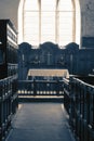 Interior of an English church with the aisle and pews either side Royalty Free Stock Photo