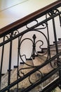 Interior of entrance hall with carved staircase