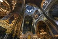 Interior of the famous St. Volodymyr Cathedral with icons and painting frescoes on the wall in Kyiv, Ukraine