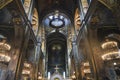 Interior of the famous St. Volodymyr Cathedral with icons and painting frescoes on the wall in Kyiv, Ukraine