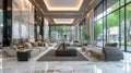 Luxurious and bright lobby interior with sofas, marble accents, and natural light Royalty Free Stock Photo