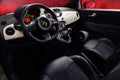 Interior Fiat 500 Abarth with leather steering wheel and plastic panel Royalty Free Stock Photo