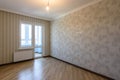 The interior of a freshly renovated kitchen without furniture in a new building