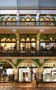 Storefronts on three stories of decorative Victorian shopping arcade of Queen Victoria Building QVB in Sydney CBD, Australia Royalty Free Stock Photo