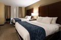 Interior of generic hotel room - two queen bed room Royalty Free Stock Photo