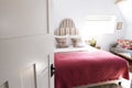 Interior Of Guest Room In Bed And Breakfast Hotel Viewed Through Door