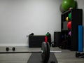 Interior a gym with balls, ropes, weights, and other accessories for exercise Royalty Free Stock Photo