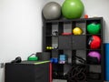 Interior a gym with balls, ropes, weights, and other accessories for exercise Royalty Free Stock Photo