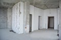 Interior hall room under construction, metal door lintels. Wall without plasterwork and ready to remodel Royalty Free Stock Photo