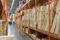 interior of hardware retailer with aisles, shelves, racks of building material insulation floor to ceiling. Royalty Free Stock Photo