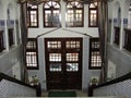 The interior of the historic building in Algeria, steep stairs and wood crafting remarkable