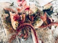 Interior horizontal image of cleaning Sardines: a medley of fish guts, fish scales, spines, bones and blood on a newspaper