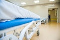 An interior of a hospital hallway with a stretchers Royalty Free Stock Photo