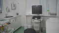 Interior of hospital room for ultrasonic diagnostics. Sono ultrasound machine in doctors room. Interior of examination