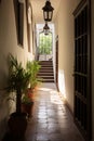 Interior of a hotel corridor with a view of the street. Colonial, country style Royalty Free Stock Photo