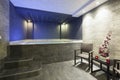 Interior of a hotel spa with jacuzzi bath with ambient lights Royalty Free Stock Photo