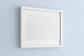 Interior house decoration, empty white frame, poster blank canvas, pictures mock up on a blue wall, living room, template angle vi Royalty Free Stock Photo