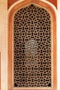 Interior of Humayun\'s Tomb, a view of symbolically cut out mihrab facing west or Mecca, over the marble lattice jali