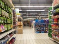 Interior of a hypermarket. Daily necessities and groceries are displayed on sales shelves and price tagged. Royalty Free Stock Photo