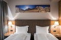 Interior of illuminated decorative bedchamber in luxurious resort
