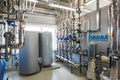 The interior of an industrial boiler house with a multitude of p