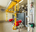 Interior of an industrial gas boiler room with boilers and pipelines Royalty Free Stock Photo