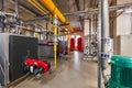 Interior of industrial, gas boiler room with boilers; pumps; sensors and a variety of pipelines Royalty Free Stock Photo
