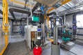 Interior of industrial, gas boiler room with boilers; pumps; sensors and a variety of pipelines Royalty Free Stock Photo