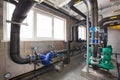 Interior of industrial, gas boiler room with boilers; pumps; sensors and a variety of pipelines Royalty Free Stock Photo