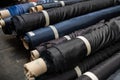 Interior of an industrial warehouse with fabric rolls samples. Small business textile colorful warehouse. Royalty Free Stock Photo