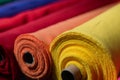 Interior of an industrial warehouse with fabric rolls samples. Small business textile colorful warehouse. Royalty Free Stock Photo
