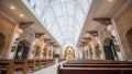 Interior inside the Catholic temple in the Philippines. Parishioners and tourists near the Christmas nativity scene