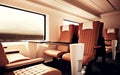 Interior Inside First Class Cabin Modern Speed Express Train.Empty Brown Chairs Window.Comfortable Seats and Table Royalty Free Stock Photo