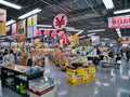 The interior or inside of a Japanese store, selling technology products.