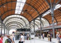 Interior of Kiel Hauptbahnhof or central train station in summer with crowd of people inside