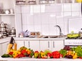 Interior of kitchen with vegetables. Royalty Free Stock Photo